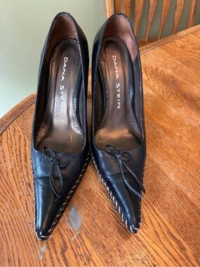 Black Pointed Leather Heels with Bow Accent